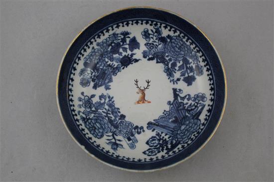 A Chinese export armorial bowl and similar saucer dish, c.1720 and a Chinese export armorial blue and white saucer dish, c.1790, 14.5cm